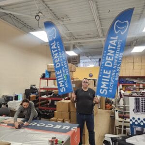 Custom double-sided feather flags printed by Dolphies Promo