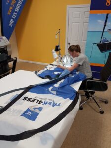 Printed feather flag fabric on a sewing table