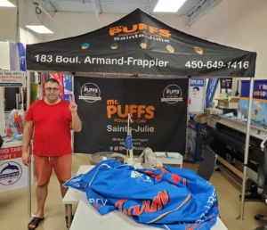Black printed canopy tent with a printed back wall in a print shop