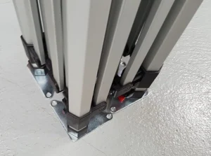 Close-up of hexagonal aluminum tent legs and a foot plate