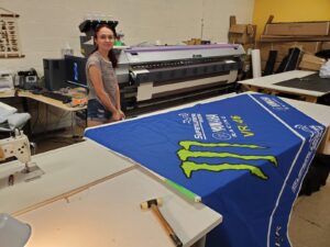 Blue printed canopy roof laid on a work table