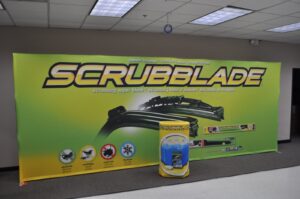 Green 20 ft pop up fabric display with a matching round printed counter