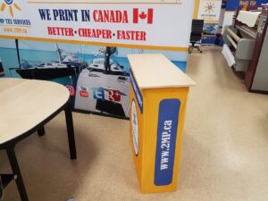 Yellow pop up fabric counter, side view