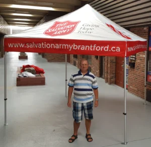 White and red printed canopy tent, indoors