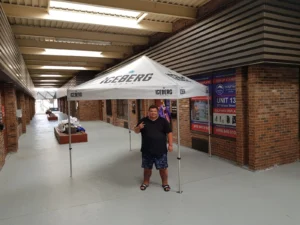 White and grey printed canopy tent, indoors