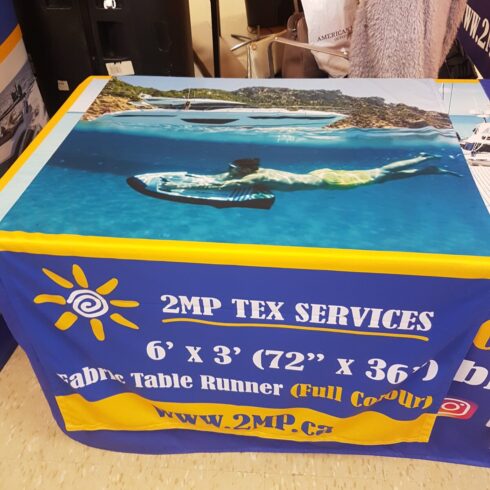 6' x 3' printed fabric table runner over a table cover