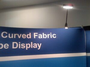 LED light shining on the top of a curved display